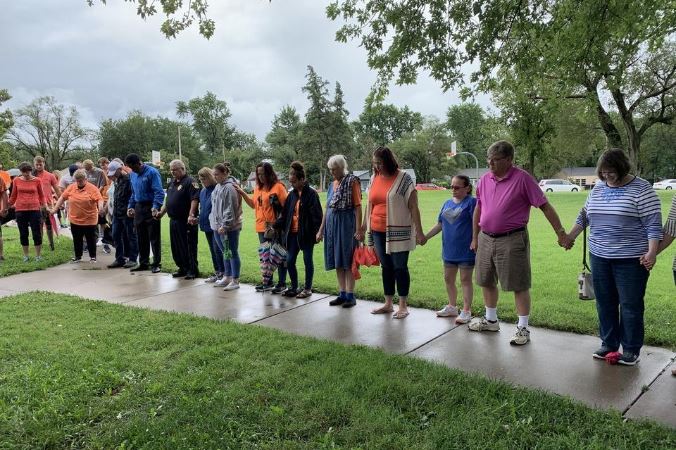 Neighborhood Peace Walk touted as ‘first step’ in bringing community together, deterring violent crime in Topeka